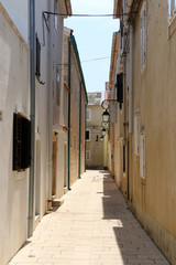 Picturesque narrow streets of town Pag, on island Pag, Croatia.