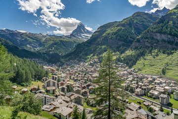 scenic view on the village of Zermatt with famous Matterhorn in the background