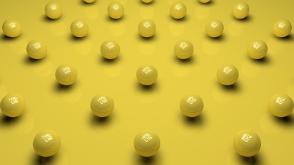 3D rendering of a set of spherical objects of yellow color with a wavy surface, on a yellow matte background. Image for the desktop background. Abstract, 3D illustration of futuristic design.