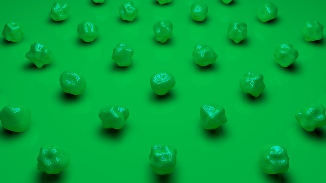 3D rendering of a set of green spherical objects with a wavy surface on a green matte background. Image for the desktop background. Abstract, 3D illustration of futuristic design.