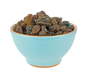 Fototapeta na wymiar Dried raisins sultanas in a blue bowl on a white background