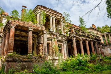 Fototapeta premium The ruins of the palace Yaroshenko late 19th century in the estate Stepanovskoe-Pavlishchevo, general view. Sanatorium Pavlishchev-Bor, Yuhnovskiy district, Kaluzhskiy region, Russia - July 2019