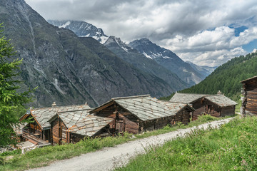 traditional wooden houses in the village of Tufteren, high above Zermatt, the famous touristic...