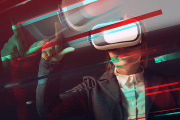 Businesswoman wearing virtual reality headset