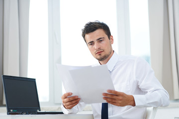 businessman working on his laptop in an office