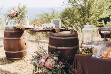 Obraz premium Boho wedding table with eco decor for guests.