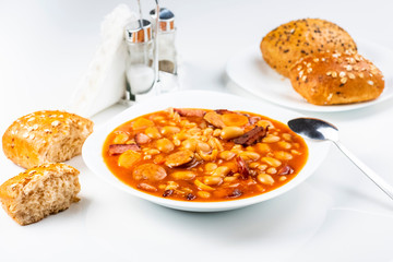 Baked beans with sausage and vegetables