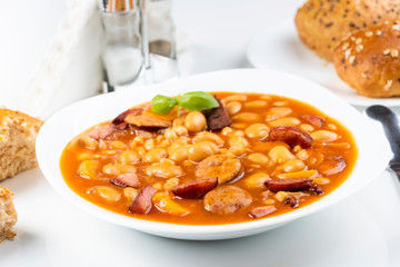 Baked beans with sausage and vegetables