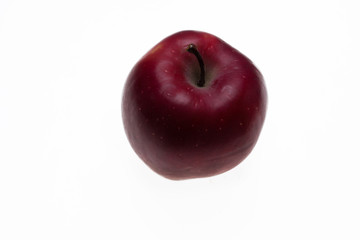 Red variety apple (black Prince) on white background