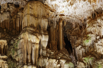 Stalactites and flow stones in a marble cave