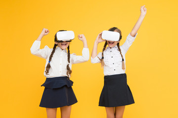 So real. Happy kids use modern technology. virtual reality. small girls in VR headset. future education. back to school. Digital future and innovation. children wear wireless VR glasses