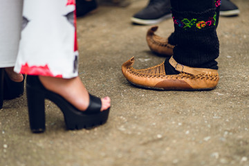 Close up on man feet wearing Serbian National Folk Folklore costume footwear Opanak or opanci on...