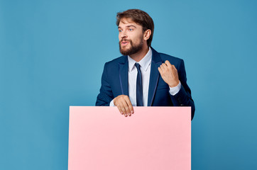 businessman holding blank sign