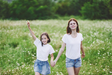 mother and daughter having fun in the park