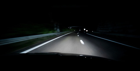 Fototapeta na wymiar Driver POV at the dark highway driving fast in France