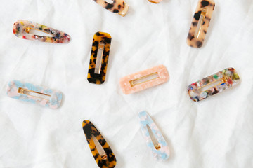 Group of Acrylic Hair Clips on White Linen Background, Women's Modern Hair Accessories, Resin...