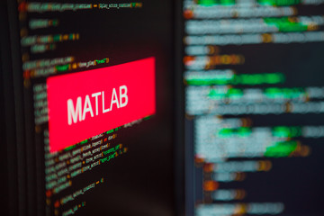 Programming language, MATLAB inscription on the background of computer code.