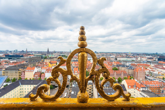 Golden ornament of the tower of Church of Our Saviour with view of city center, Copenhagen, Denmark
