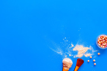 Instruments for make up with brushes, blusher on blue background top view mock up