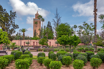 Landscape view of the Koutoubia mosque and green garden in front. Marrakech , Morocco