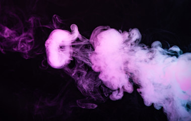Texture of colored smoke on a black background
