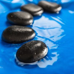 Obraz na płótnie Canvas Wet Pebbles / Stones