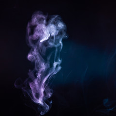 Obraz premium Abstract colorful smoke on black background .