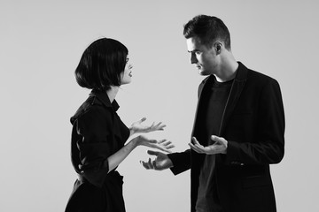 man and woman shaking hands