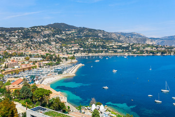 Naklejka na ściany i meble Landscape panoramic coast view between Nice and Monaco, Cote d'Azur, France, South Europe. Beautiful luxury resort of French riviera. Famous tourist destination with nice beach on Mediterranean sea