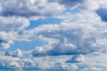 High detail fluffy clouds on blue sky background