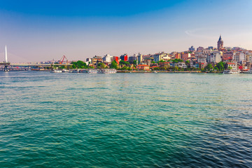 Naklejka premium Panoramic view of Istanbul. Panorama cityscape of famous tourist destination Golden Horn bay part of Bosphorus strait. Travel landscape Bosporus, Turkey, Europe and Asia.