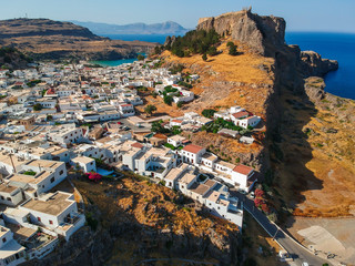 Aerial birds eye view drone photo of village Lindos, Rhodes island, Dodecanese, Greece. Sunset...