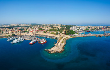 Aerial birds eye view drone photo of Rhodes city island, Dodecanese, Greece. Panorama with Mandraki port, lagoon and clear blue water. Famous tourist destination in South Europe