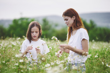 mother and daughter having fun in the park