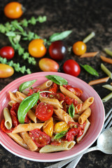  Penne pasta with  cherry tomatoes confit. multicolored cherry