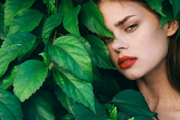 beautiful woman green leaves nature park