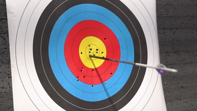 Target for archery shooting. Arrow hitting the target. Hit the goal, success and achievement concept .
