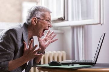 Furious and enraged old business lady