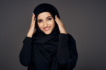 Woman in a black hijab