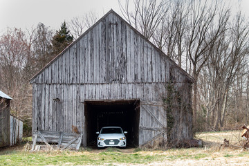 Car in a Barn