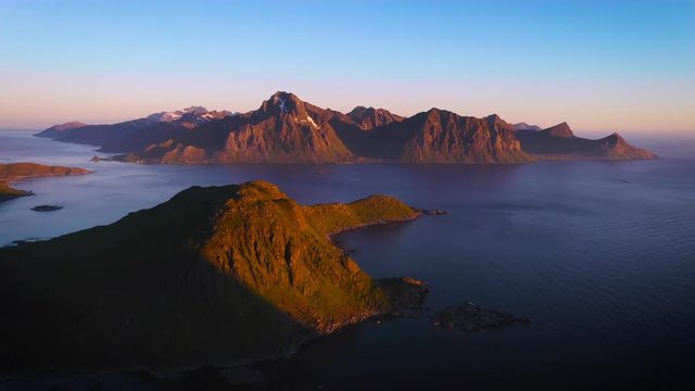 aerial view. flight over the sea,view on the Flakstadoya from Haukland beach and Mannen peak
