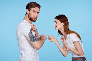 Young Couple In White Studio T-Shirts