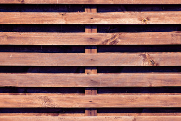 Brown wooden texture. Wooden rake abstract background. The surface of the tree with a pattern of...