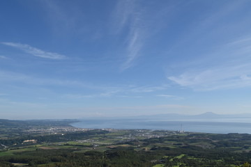 Fototapeta premium Landscape with field and ocean in Hokkaido, Japan