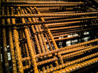 Roll bars that have become rusty orange construction in the area
