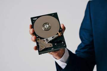 Obraz premium hand with a disk isolated on white background