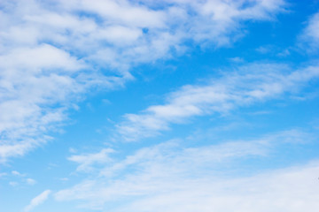 Blue sky background and soft white clouds , copy space