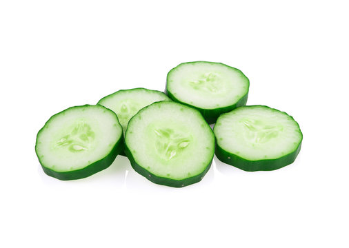 Cucumber and slices isolated on a white background