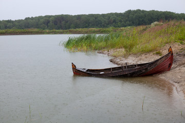 Boat on the beach. © lamzin