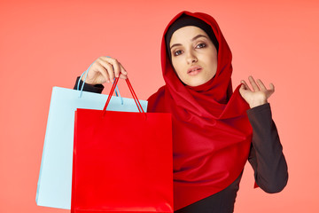 Fototapeta na wymiar young woman with shopping bags